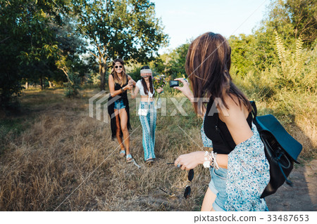 Girl with closed eyes lead by the hand 33487653