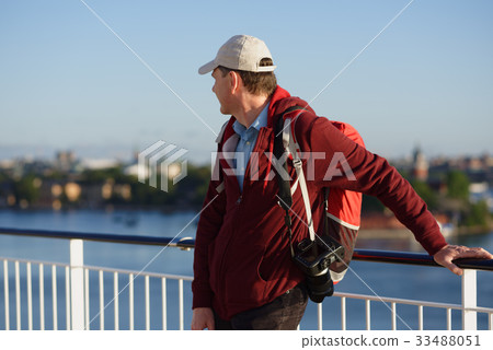 Tourist on a deck of cruise ship 33488051