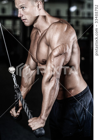 Brutal caucasian handsome fitness men on diet training triceps g Brutal caucasian handsome fitness men on diet training triceps g 33488702