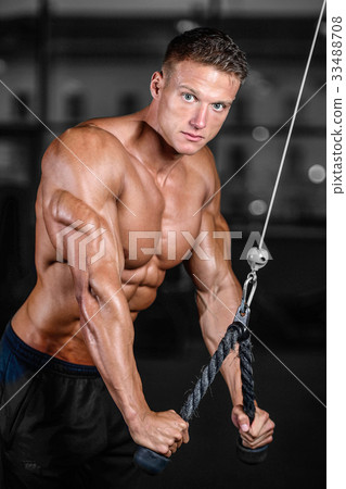 Brutal caucasian handsome fitness men on diet training triceps g 33488708