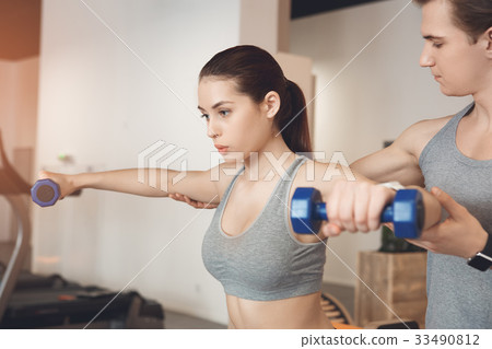 Young people training in gym body fit care 33490812