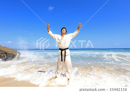 Men training on a beautiful tropical country beach Men training on a beautiful tropical country beach 33492158