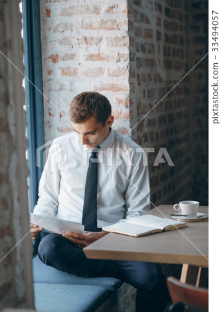 businessman in cafe 33494057