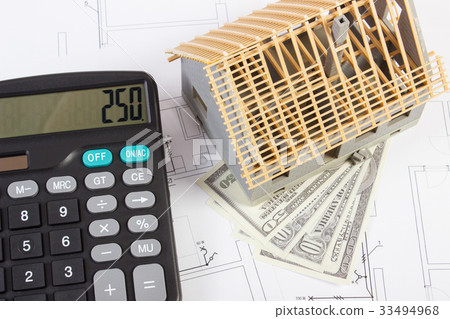 House under construction, calculator and dollar House under construction, calculator and dollar 33494968