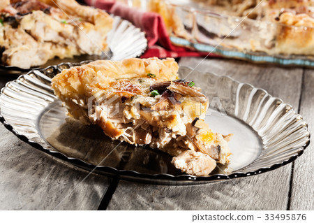 Slice of tart with chicken amd mushrooms 33495876