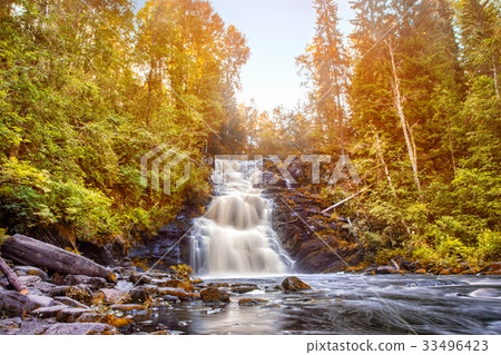 beautiful waterfall in forest 33496423