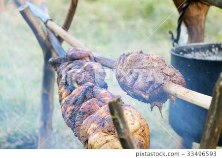Goth meat cooking on spear Goth meat cooking on spear 33496593