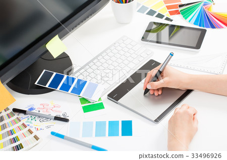 Graphic designer at work. Color samples. Graphic designer at work. Color samples. 33496926
