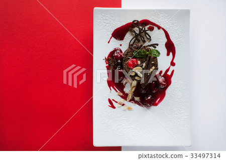 Chocolate cake on contrast colorful background Chocolate cake on contrast colorful background 33497314