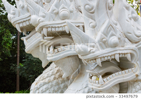 Fragment of white ceramic naga snake statue Fragment of white ceramic naga snake statue 33497679