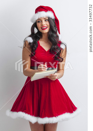 Santa girl with wish list Santa girl with wish list 33497732