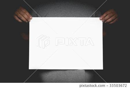 Human hands holding blank advertising card. 33503672