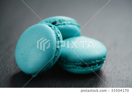 bright azure macarons on slate background bright azure macarons on slate background 33504170