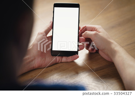 young man hands holding smartphone with blank 33504327