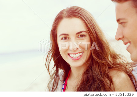 Romantic young couple on the beach Romantic young couple on the beach 33513329