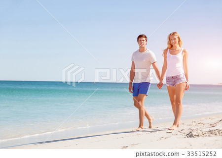 Romantic young couple on the beach Romantic young couple on the beach 33515252