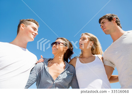 Company of young people on the beach 33516068