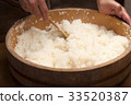 Sushi rice making 33520387