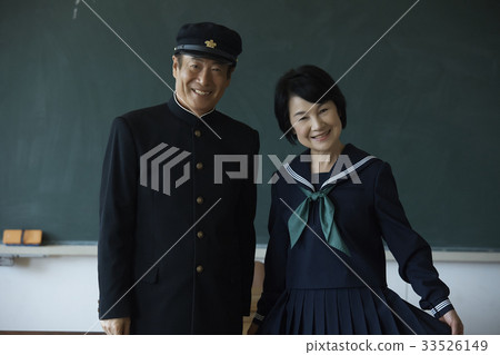 Senior man and woman in uniform Senior man and woman in uniform 33526149