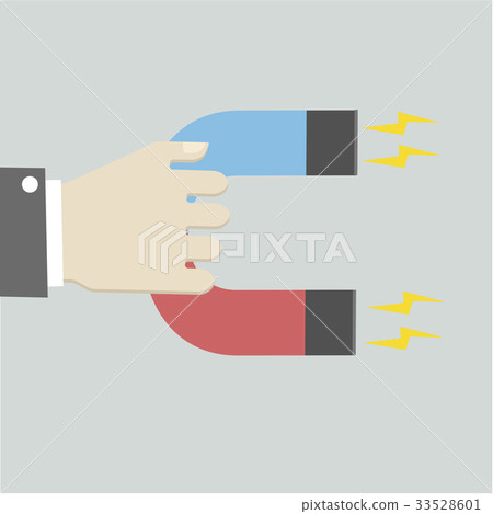 hand holding Magnet hand holding Magnet 33528601