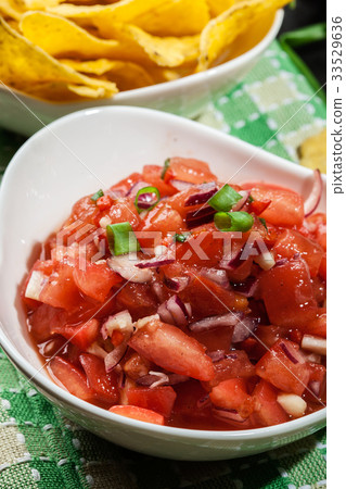 Bowl of fresh salsa with tortilla chips Bowl of fresh salsa with tortilla chips 33529636