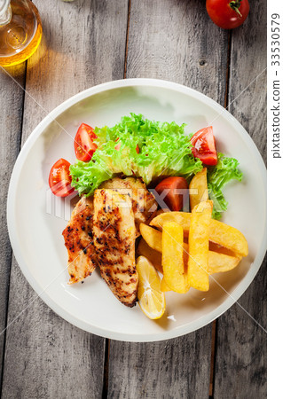 Grilled chicken breasts Grilled chicken breasts 33530579
