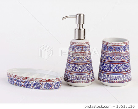 Beautiful ceramic bathroom accessories isolated Beautiful ceramic bathroom accessories isolated 33535136