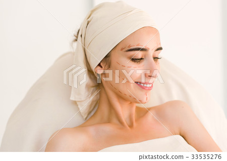 Young woman before plastic surgery operation. 33535276