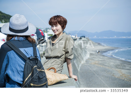 Woman travel sea short trip walk walk 33535349