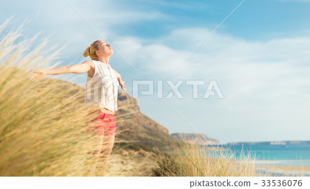 Free Happy Woman Enjoying Sun on Vacations. Free Happy Woman Enjoying Sun on Vacations. 33536076