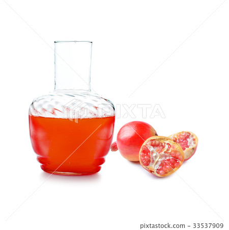 Red pomegranate juice on white background 33537909