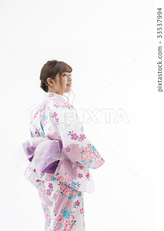 A woman in a yukata A woman in a yukata 33537994