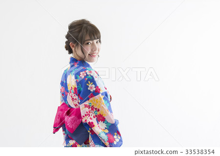 A woman in a yukata A woman in a yukata 33538354