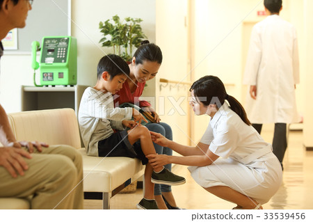 Nurse and boy 33539456