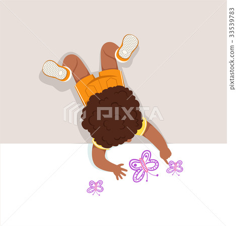 Little boy lying on his stomach and painting 33539783