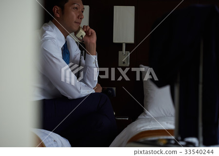 Businessman (request room service) 33540244
