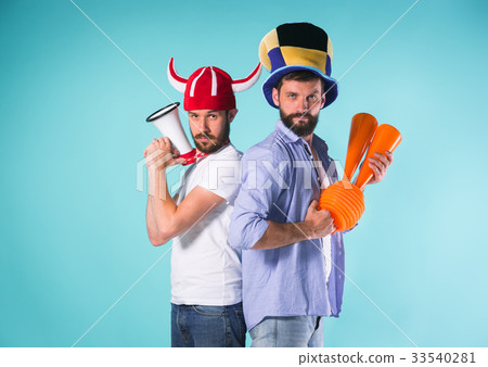 The two football fans over blue 33540281