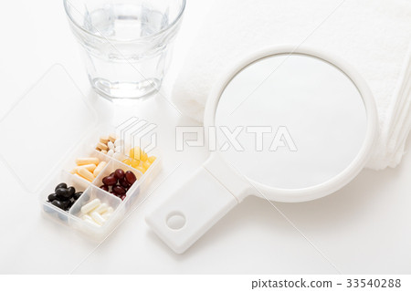 Towel and hand mirror Towel and hand mirror 33540288