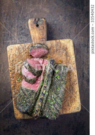 Barbecue Saddle of Venison on Cutting Board 33540432