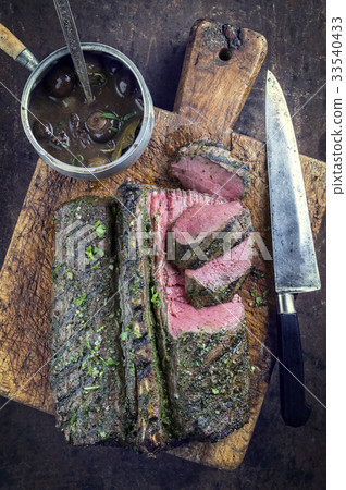 Barbecue Saddle of Venison on Cutting Board Barbecue Saddle of Venison on Cutting Board 33540433