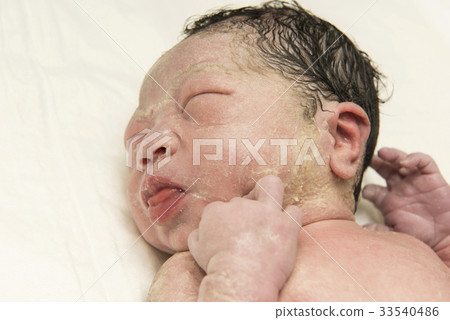 Baby right after giving birth Baby right after giving birth 33540486