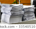 White paper irregular stack in the office 33540510