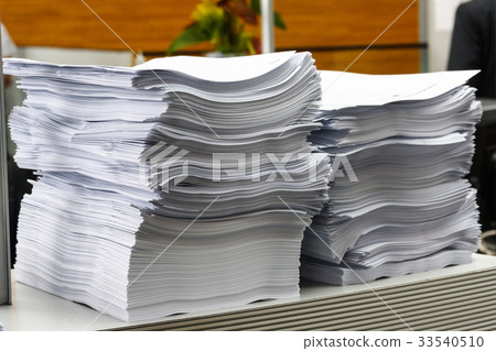 White paper irregular stack in the office White paper irregular stack in the office 33540510