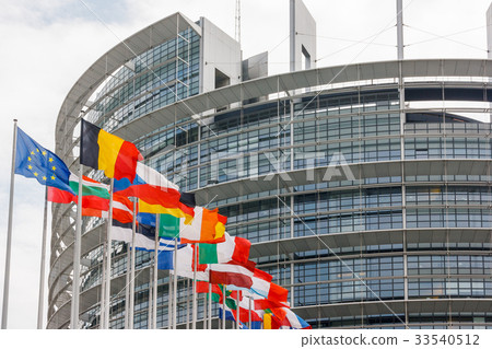 European Parliament building with flags European Parliament building with flags 33540512