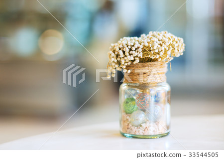 Dried flowers in glass bottle Dried flowers in glass bottle 33544505