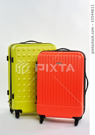 Bright summer suitcases for sale. 33544611