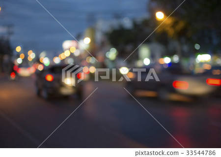 Blur light car on street at night, abstact bokeh Blur light car on street at night, abstact bokeh 33544786