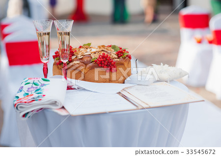 Wedding glasses filled with champagne at banquet Wedding glasses filled with champagne at banquet 33545672