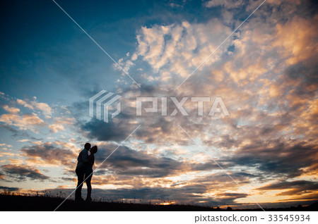 Couple lover holiday happy silhouette sky sunset 33545934