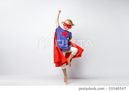 Very excited little girl dressed like superhero Very excited little girl dressed like superhero 33546547